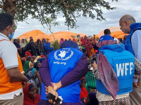 World Vision staff with partners at a distribution