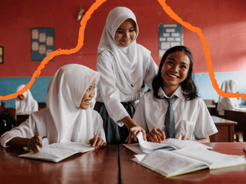 Girls happily learning in school